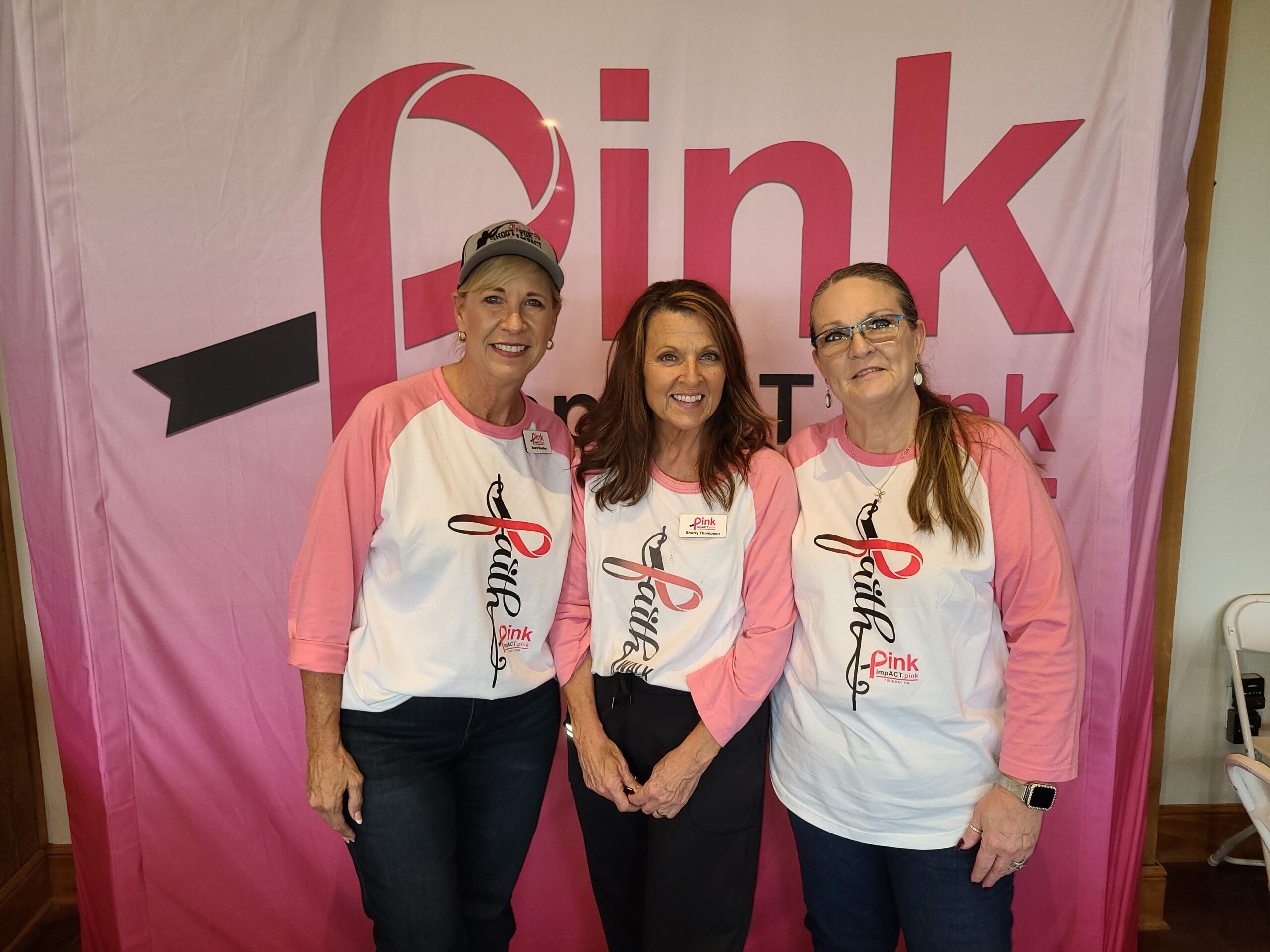 Pink ImpACT community members at a fundraising event